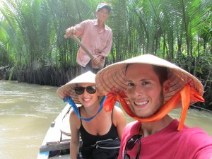 hand rowed Sampn in the mekong