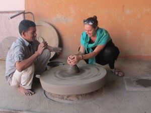 Adena trying to make pottery in a Jodhpur village