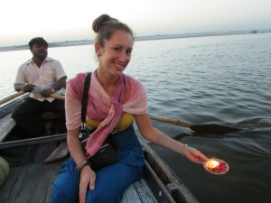 Dropping a good luck lotus flower into the Ganges River
