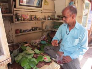 Local man making palm (sweet chew)