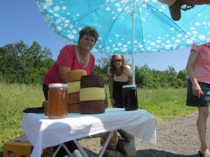 Buying local honey and cheese on the side of the road